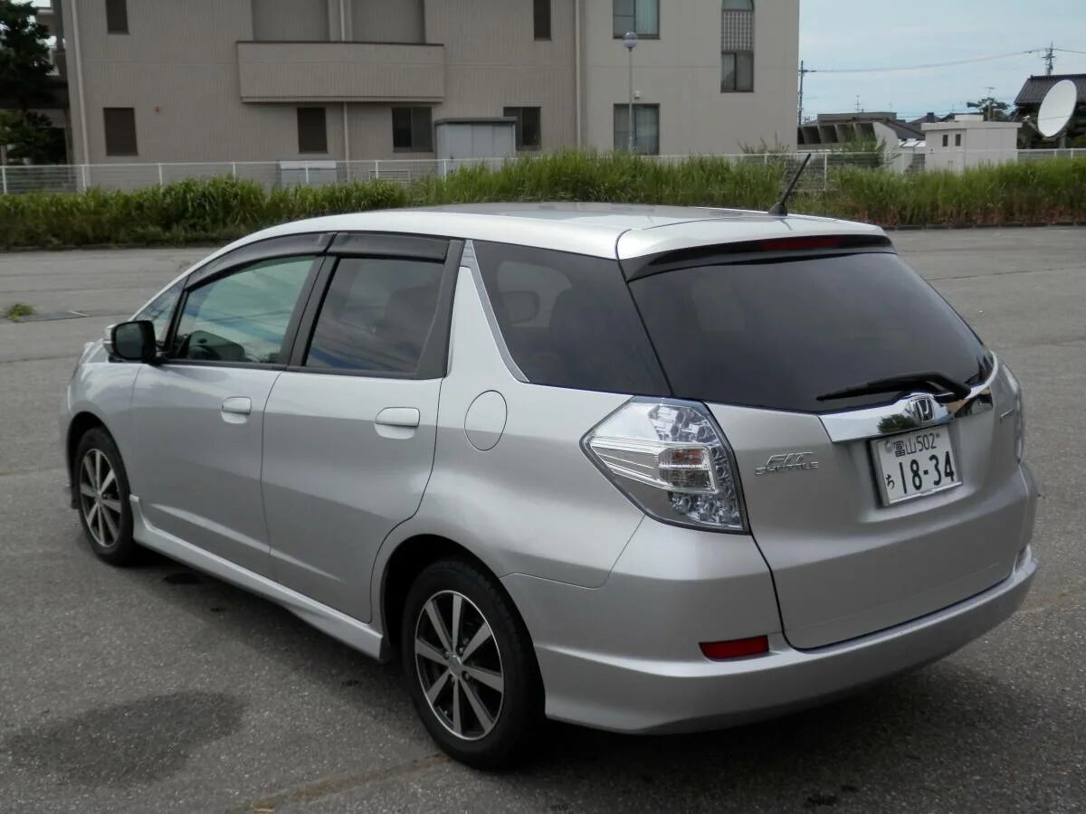 Honda Fit Shuttle Hybrid 2011. Honda Fit Shuttle Hybrid. Honda Fit Shuttle Hybrid 2012. Хонда фит шаттл гибрид.