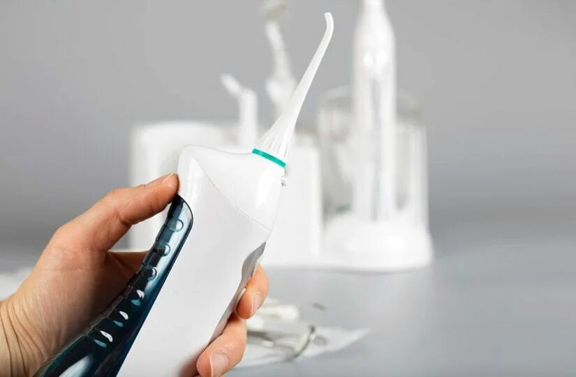 Ирригатор что такое и для чего нужен. Ирригатор water flosser. ирригатор waterpik портативный. ирригатор стоматологический для полости рта.