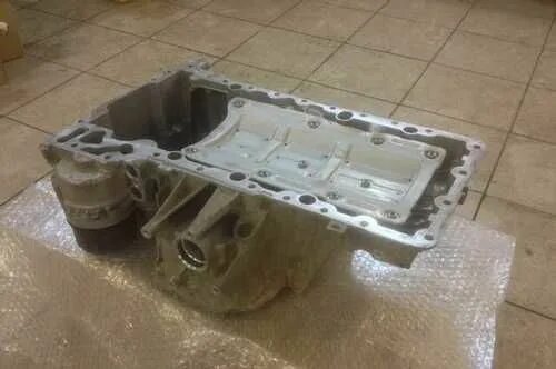 0 бензин. Поддон акпп bmw x2. Поддон масляный акпп бмв g07. 4 х5 е53 бмв. Поддон картера bmw e70 n57.