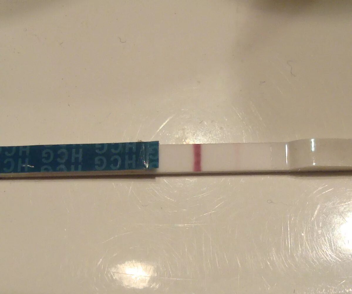 2. Бишурс тест на беременность слабая вторая полоска. 26 день после овуляции. 1. 26 день после овуляции.