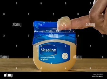 Jar of vaseline petroleum jelly and a lady's finger Stock Photo - Alam...