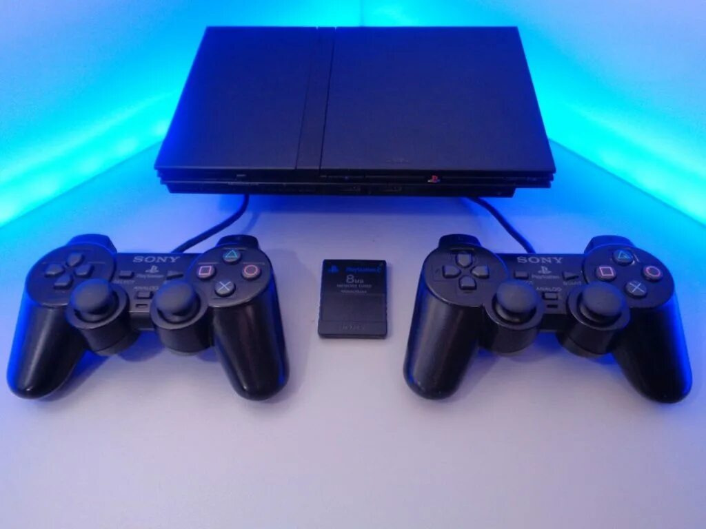 Форматы плейстейшен. Sony ps2 slim black. ps2 super slim. сони плейстейшен 2 слим. игровая приставка sony playstation 2 slim.