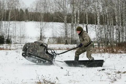Мотособака по глубокому снегу