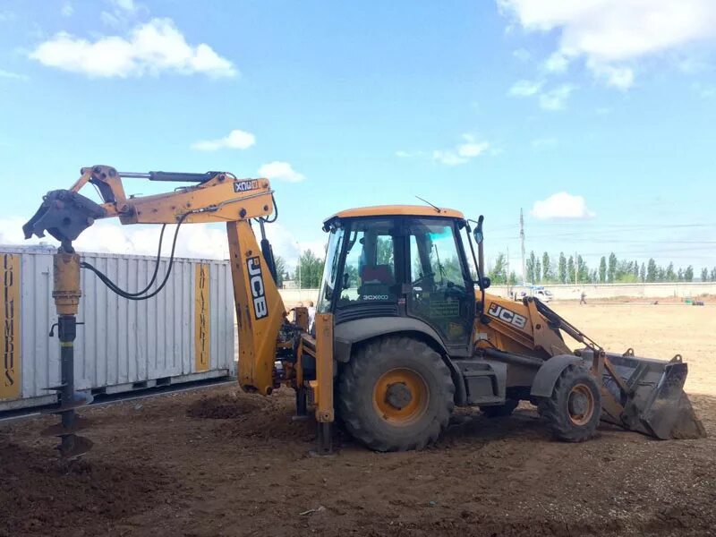 Ямобур komatsu. Гидробур jcb 4cx. Бур на jcb 3cx. Экскаватор бур jcb 3 cx. Гидробур jcb 4cx.