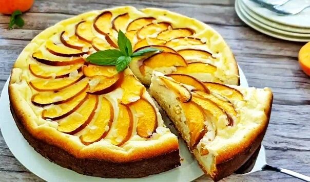 Творожно персиковый пирог рецепт. Выпечка с персиками. пирог из персиков. пирог с персиками и творогом в духовке. пирог с персиками консервированными.