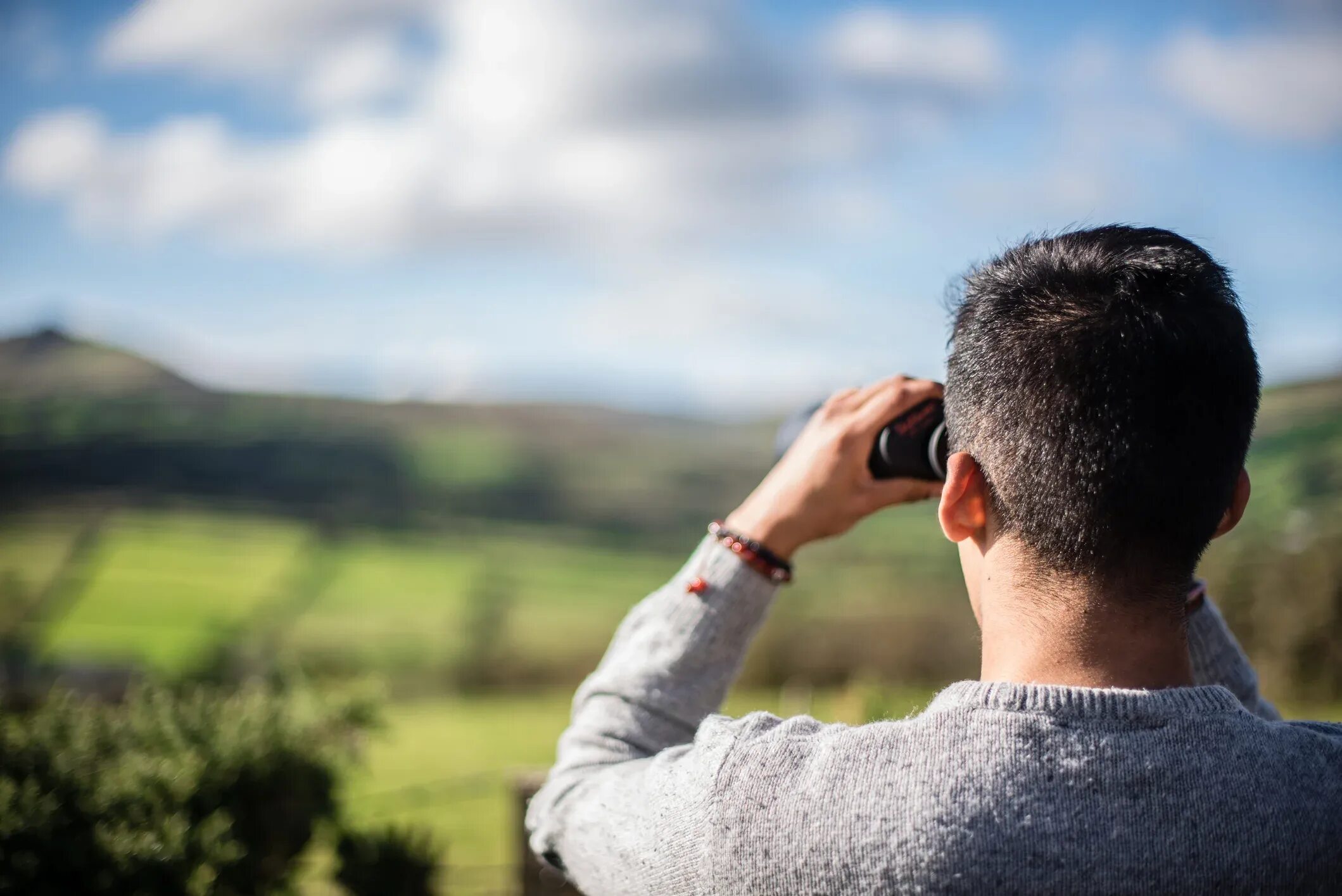 Man looking forward. Man Binoculars. Man with Binoculars. Looking Binoculars. Here s back