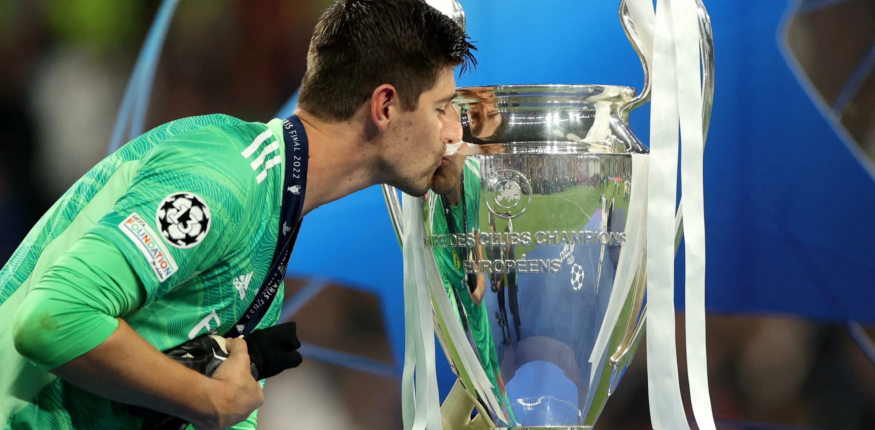 Рекордсмен уефа. Real Madrid Champions League 2022 Courtois. Реал с Кубком чемпионов. Тату Куртуа лига чемпионов. Квалификационном турнире Лиги чемпионов УЕФА 2022 киберфутбол.