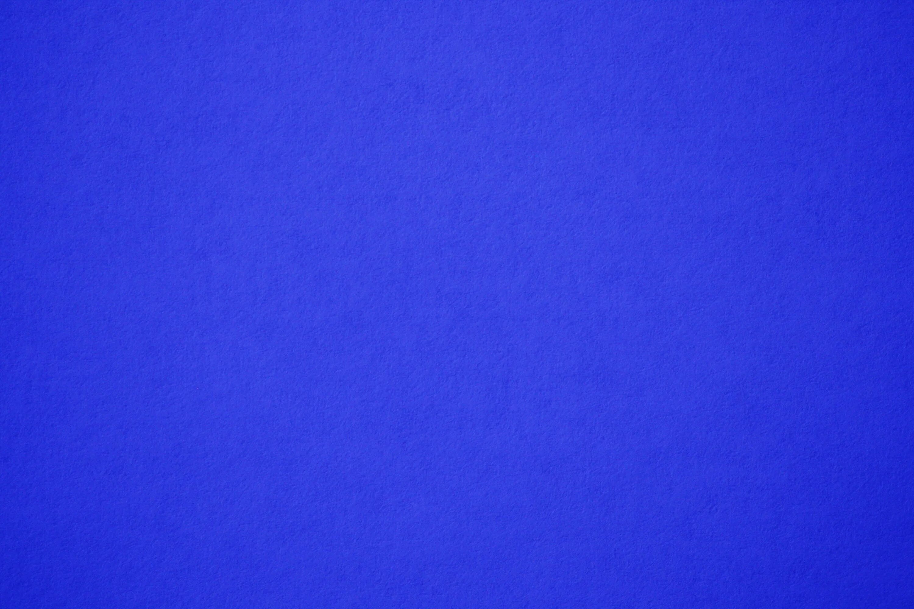 Синяя бумага. Синий цвет. Синий фон. Сплошные цвета однотонные. Очень яркий голубой цвет
