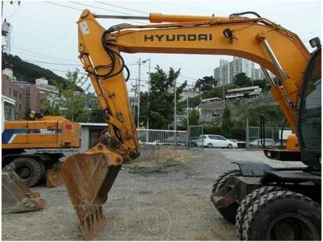 Hyundai 1400. Hyundai 1400w-7a. Экскаватор Хундай 1400 w7. Экскаватор Хундай 1400 w7 2006. Ekiskvatir hunday 1400w-7a karopka.