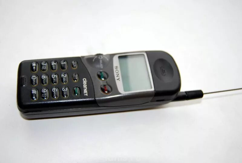 Сотовые телефоны 90. Motorola 90. Motorola 1990. Моторола с антенной 90х. Радиотелефон 90 х нокиа.