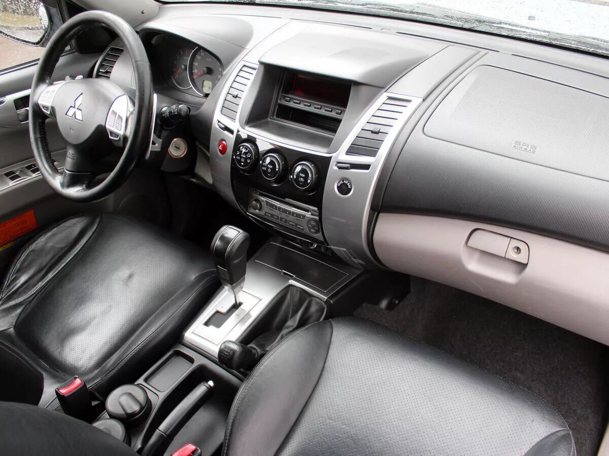 салон паджеро спорт 2. паджеро 4 салон салона внутри. Mitsubishi pajero sport 2012 салон. Mitsubishi pajero sport 2. салон mitsubishi pajero sport 2 2008.