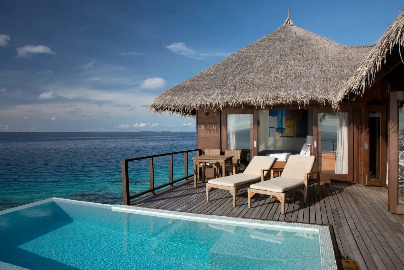 Coco bodu Hithi Maldives 5. Коко вилла Мальдивы. Coco Palm bodu Hithi Мальдивы. Water Villa Мальдивы. Отель на берегу океана