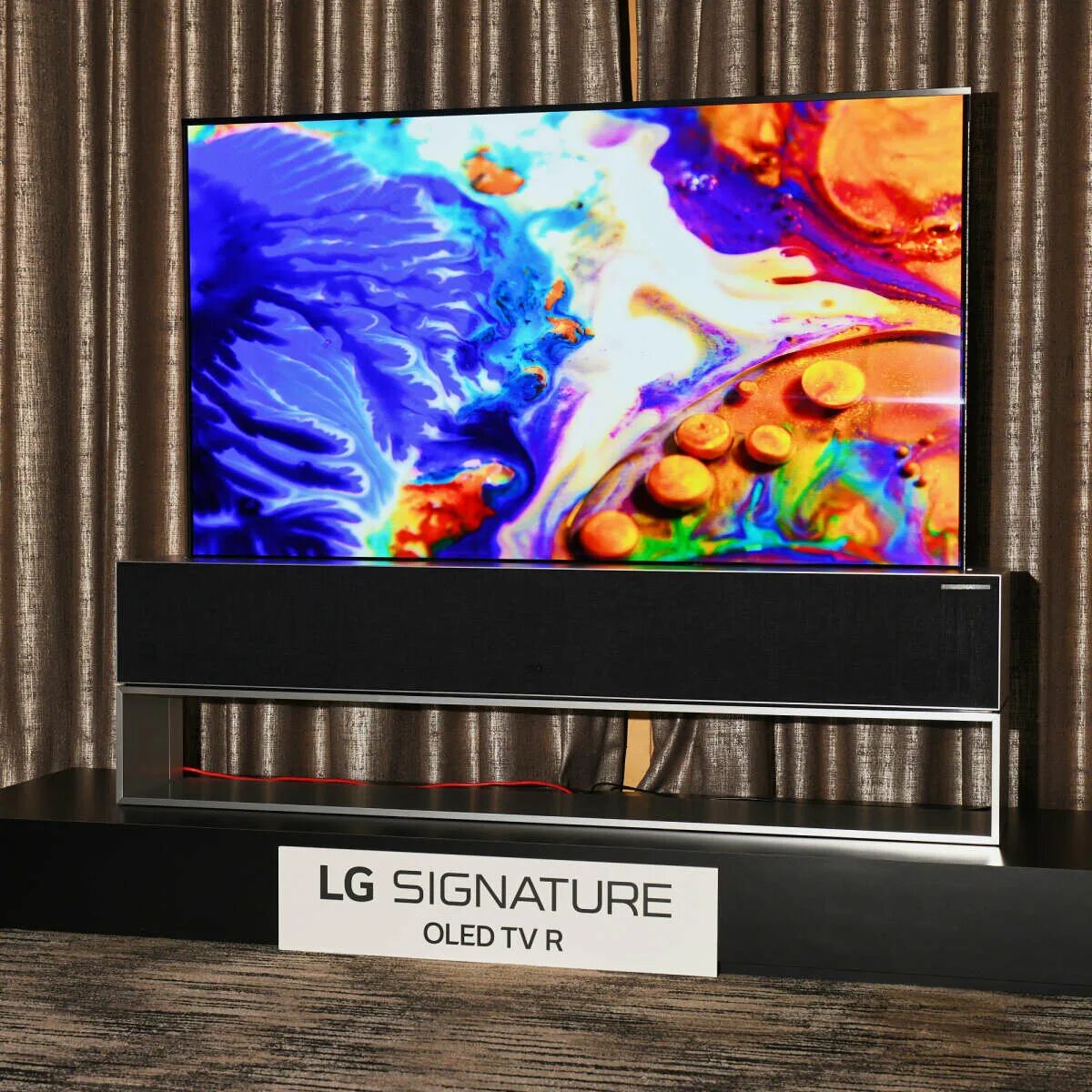 Oled телевизоры 2024. LG Rollable OLED. LG Signature OLED TV r9. LG Signature OLED R. LG Rollable TV.