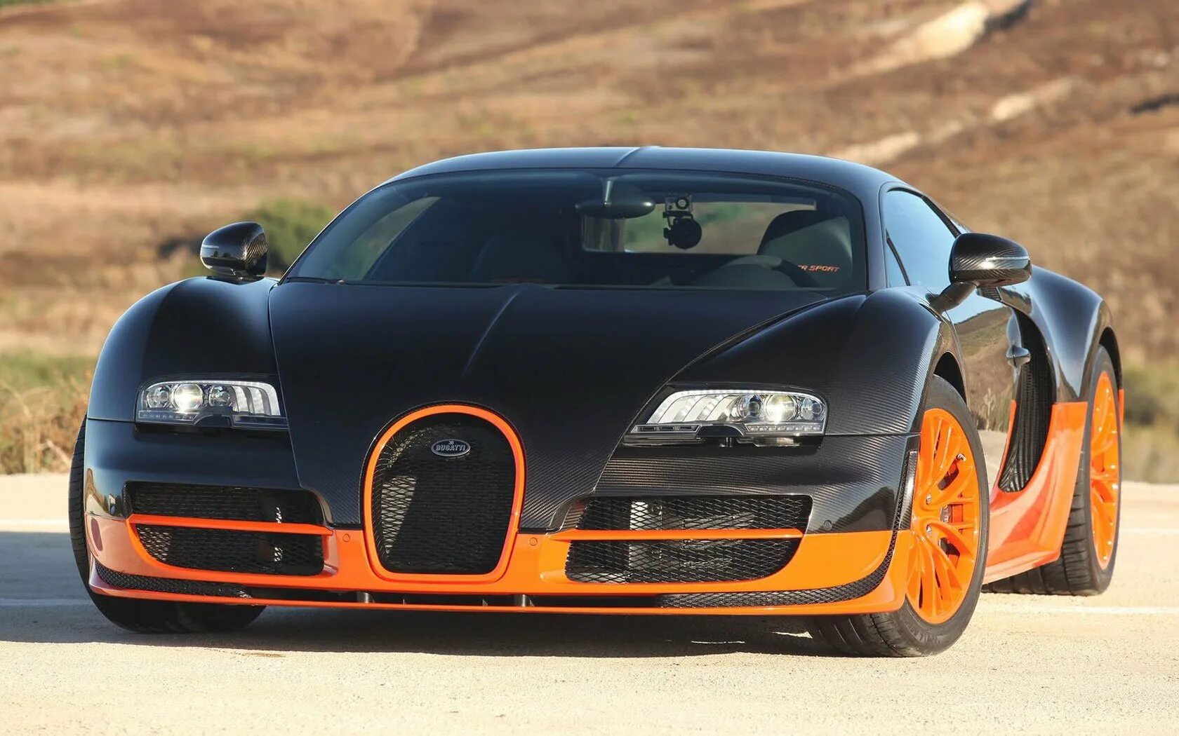 Бугатти Вейрон супер спорт. Bugatti Veyron 16.4. Bugatti Veyron 16.4 super Sport 2010. Bugatti Veyron 16.4 super Sport Black. Что такое бугатти