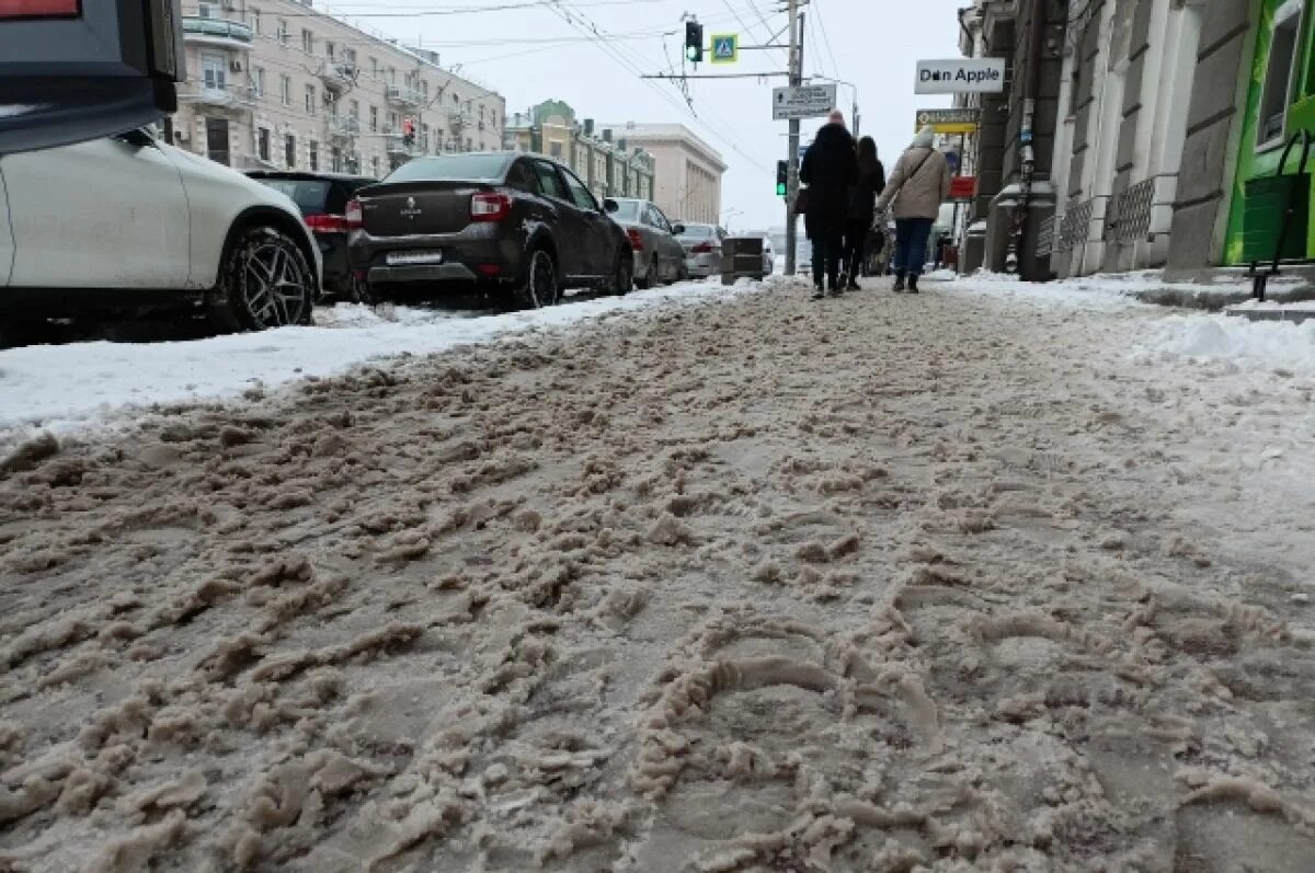 Потепление в ростове. Снегопад 2014 года в Ростове на Дону. Снег в Ростове на Дону. Ростов на Дону снегопад. Снег на тротуаре.