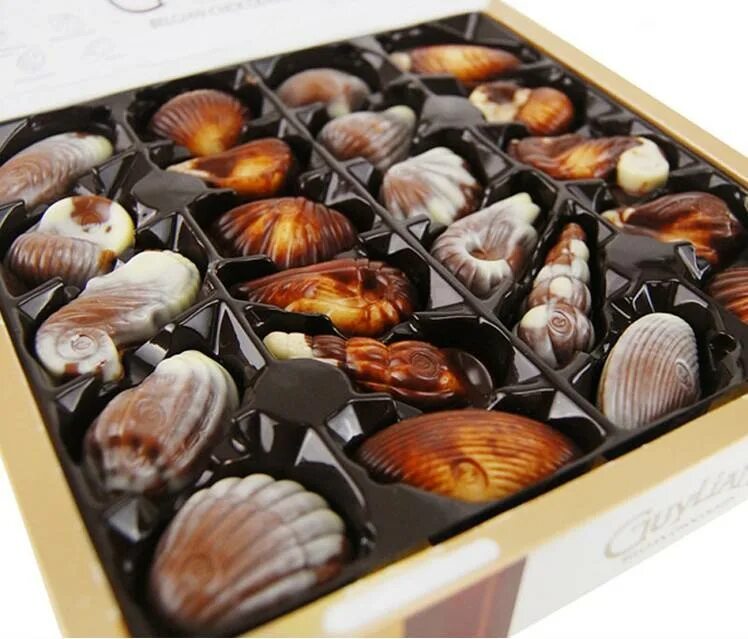 Конфеты ракушки мэри эннинг. Амери ракушки. Амери ракушки. Шоколадные конфеты с начинкой пралине ameri 250 г, бельгия. Амери ракушки.