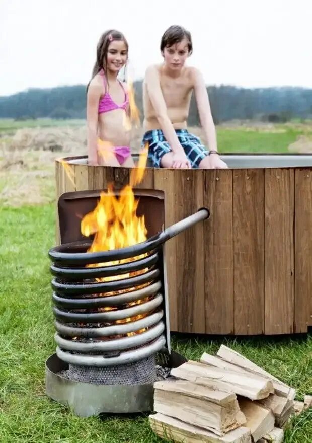 Печка для нагрева воды. Бочка бассейн с подогревом. Печка для бассейна на дровах. Обогреватель для бассейна на дровах.