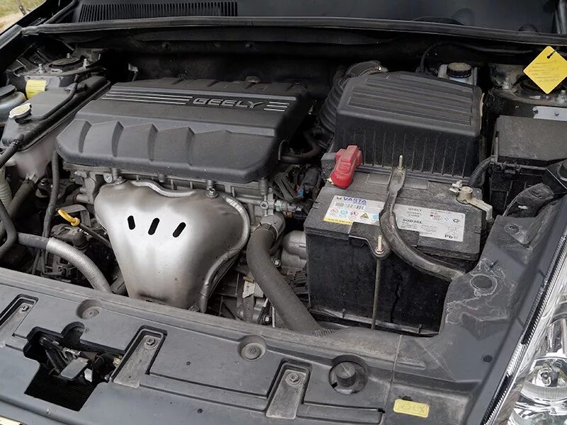 Двигатель geely emgrand x7. Geely Emgrand x7 2014 двигатель. Двигатель Geely Emgrand x7 2.0. Geely Emgrand x7 2016 двигатель. Geely Emgrand x7 подкапотка.