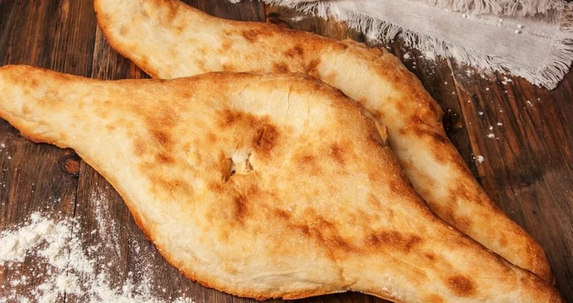 грузинского хлеба шоти пури. шотис пури. шоти лаваш по грузински. шотис пури. грузинский хлеб шоти.