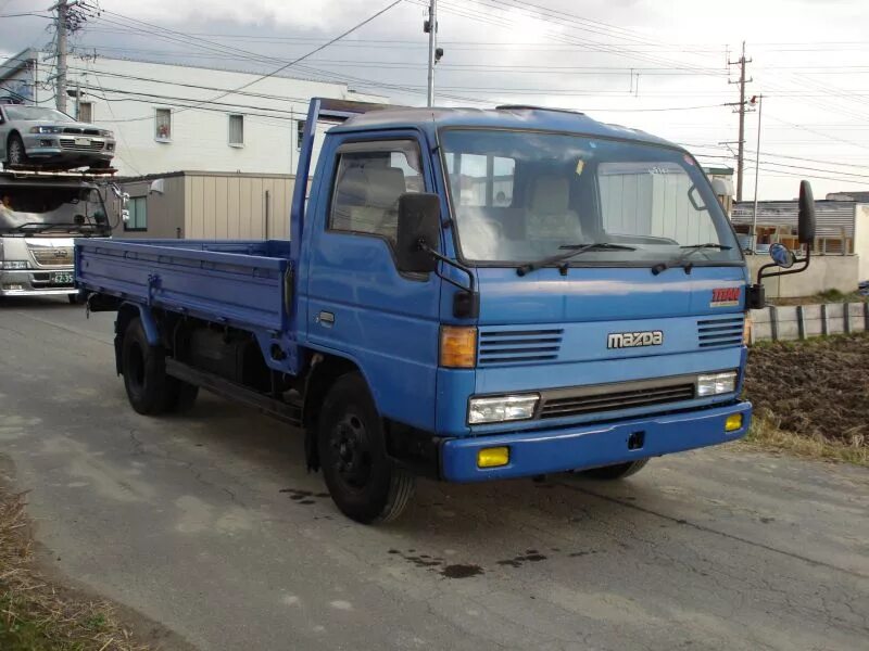 Mazda бортовой. Мазда Титан 2003 3 тонн. Мазда Титан 3 тонны. Мазда Титан 1.5 тонны. Мазда Титан бортовой 2т.