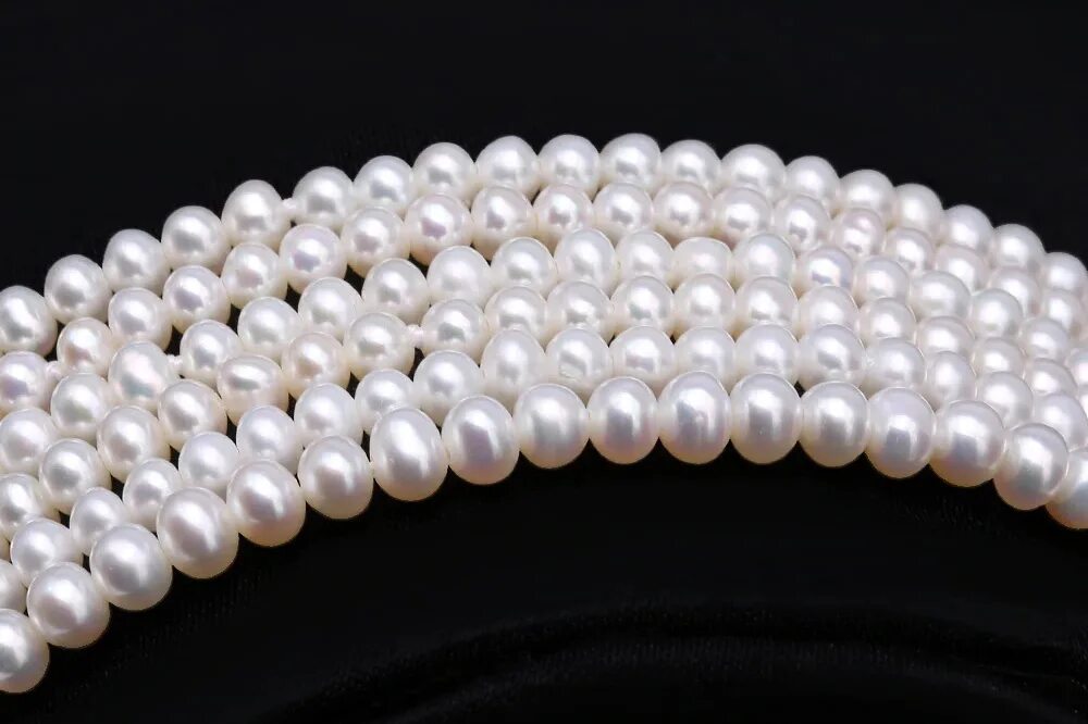 Жемчуг искусственный и культивированный. Tang yue жемчуг. Как отличить натуральный жемчуг. Жемчуг akoya. Форма натурального жемчуга.