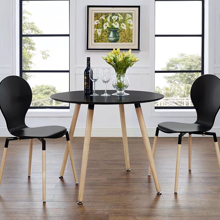 Черный стол на кухне. Стол Dining Table черный. Стулья МИД сенчури обеденные. Круглый стол в интерьере. Круглый обеденный стол в интерьере.