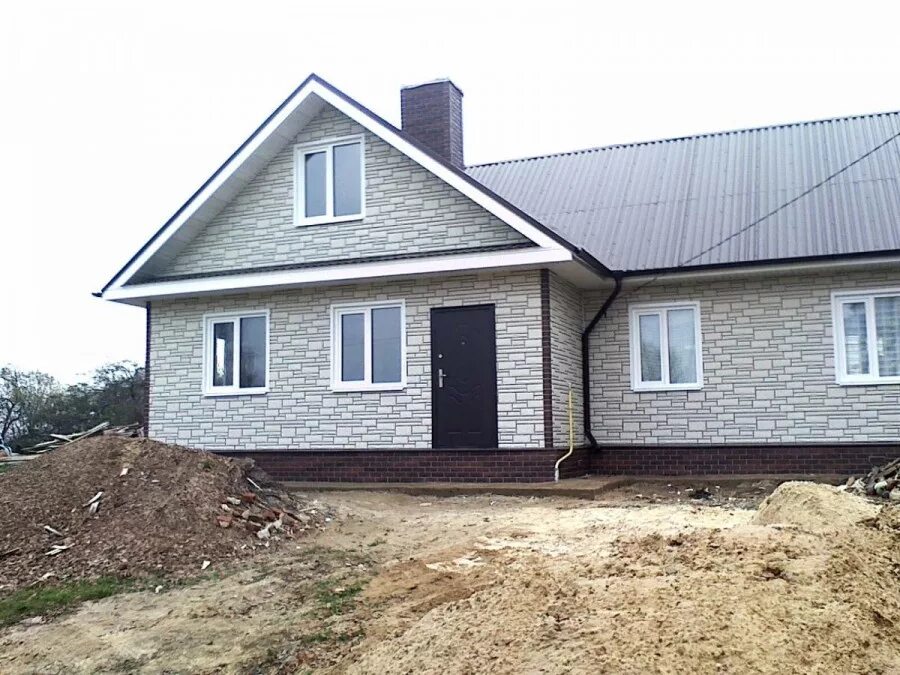 Крыша цоколь. Отделка фасада камнем. Обшивка домов снаружи. Фасадная панель docke сланец валь-гардена. Фасад дома варианты.