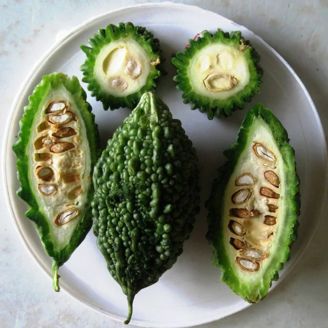 крымский гранат момордика. как едят момордику. индийский огурец момордика. как едят момордику. индийский гранат момордика.