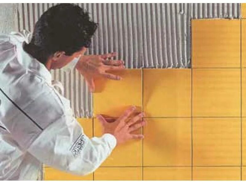 Облицовка керамической плиткой. Облицовка керамической плиткой. Укладка плитки. Отделка стен керамической плиткой. Укладка мозаики.