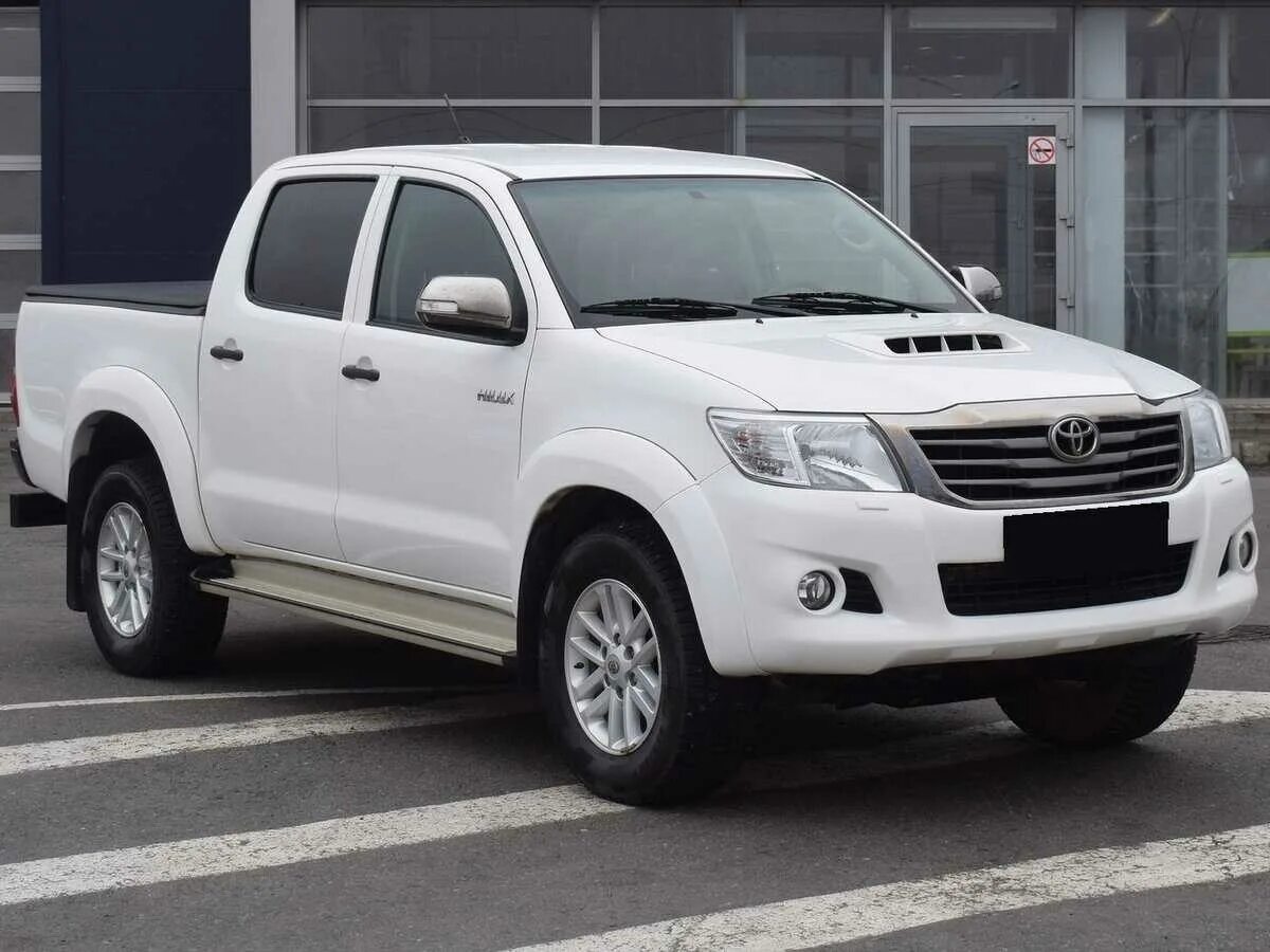 Тойота хайлюкс 2012 цена. Toyota Hilux 2014. Хайлюкс Тойота 14 год. Тойота Хайлюкс 2015 года. Пикап 2014 Тойота.