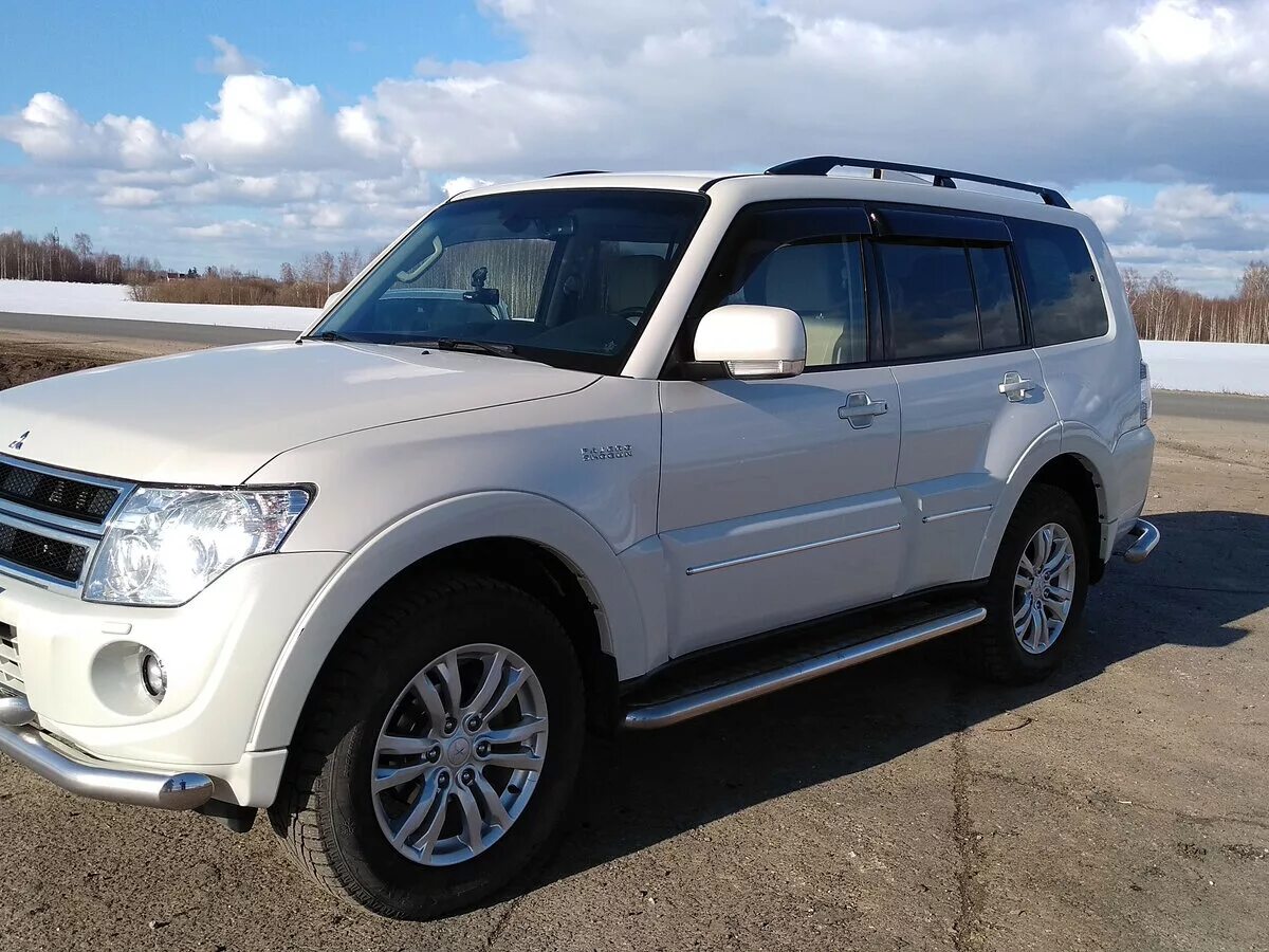 Мицубиси паджеро 2014. Митсубиси Паджеро 2014 белый. Mitsubishi Pajero 2007 белый. Митсубиси Паджеро 4 2014.