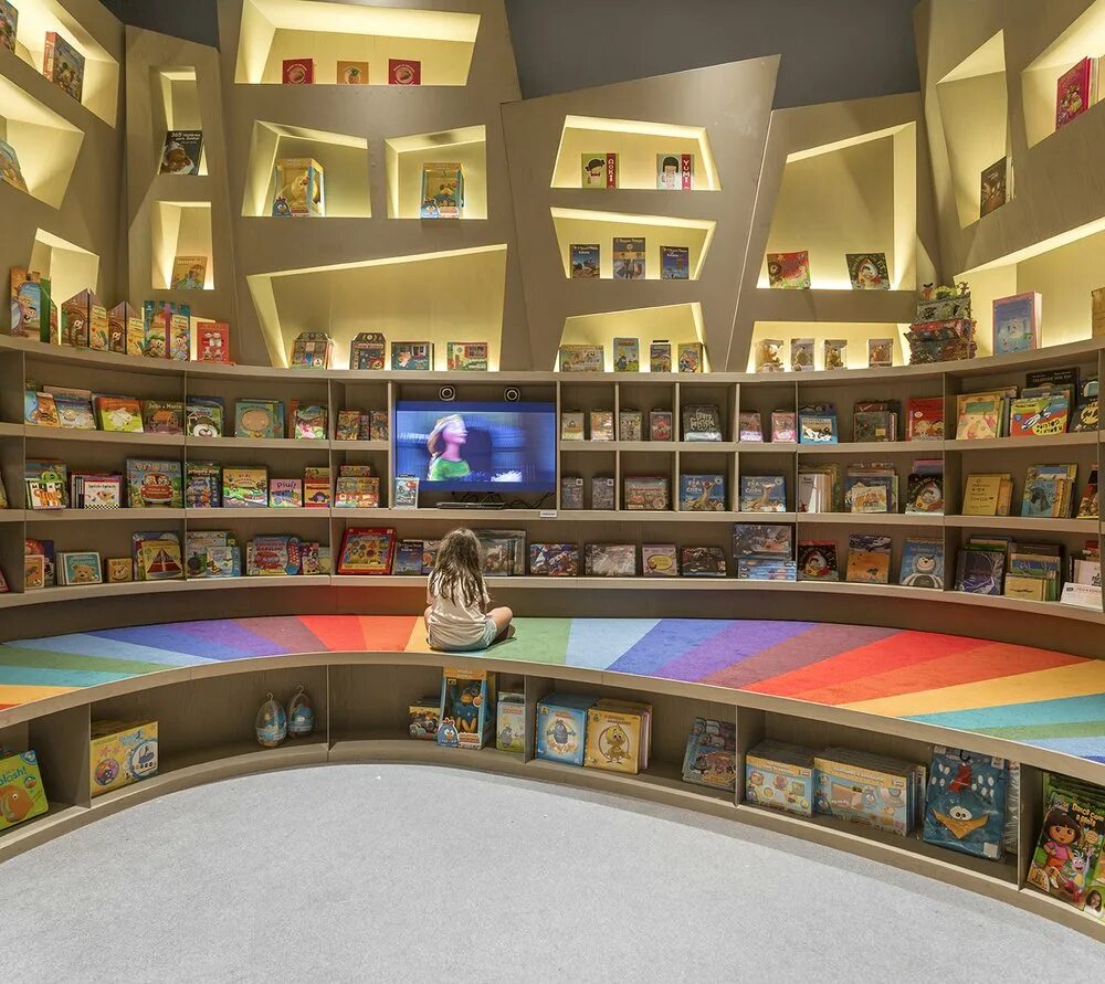 Детский клуб в библиотеке. Библиотека будущего. Детские библиотеки. Интерьер детской библиотеки. Игровая зона в библиотеке.