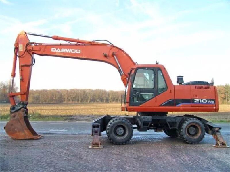 Solar 210w. Doosan daewoo solar 210w-v. экскаватор doosan solar 210w-v. экскаватор solar 210. дусан 210 колесный.