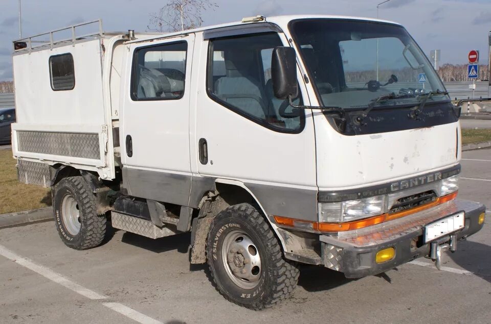 Грузовики 4вд приморский край. Mitsubishi Canter fd501b 4 WD двухкабинник. Митсубиси Кантер двухкабинник 4х4. Митсубиси Кантер 1994 двухкабинник. Canter fd501b.