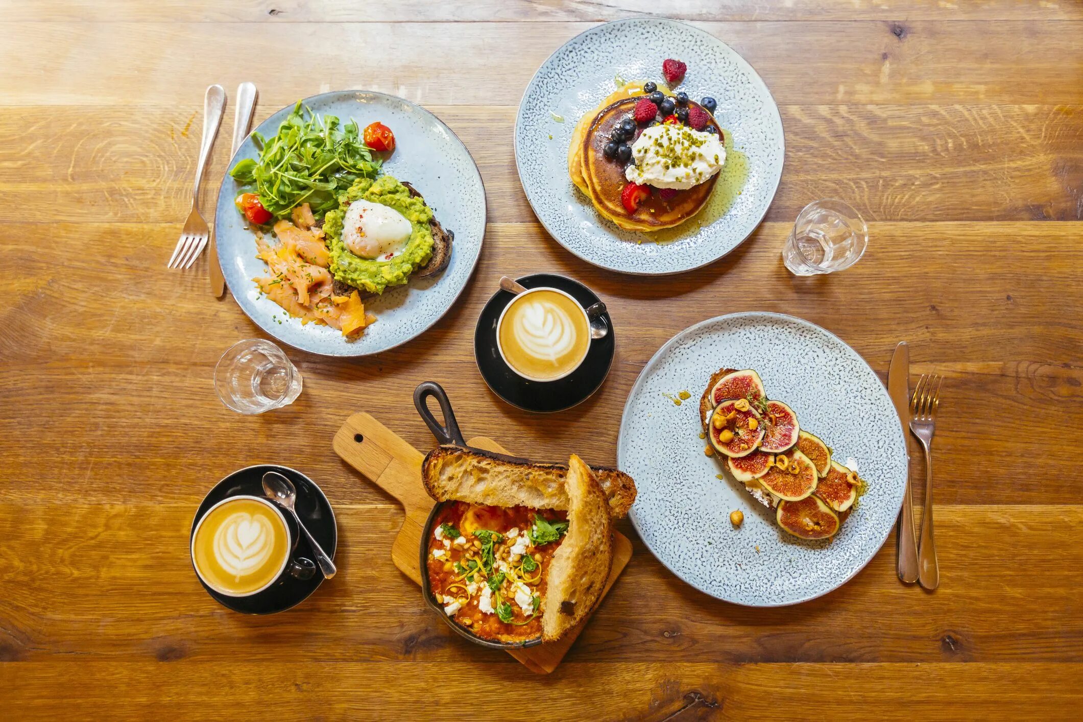 Pancakes with Salmon Breakfast. Ellise over Breakfast. Dining view from above. Breakfast around the World exercises.