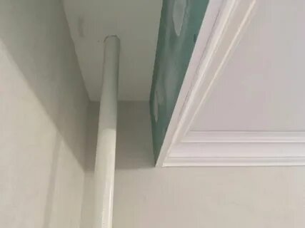 Как закрыть трубы на потолке