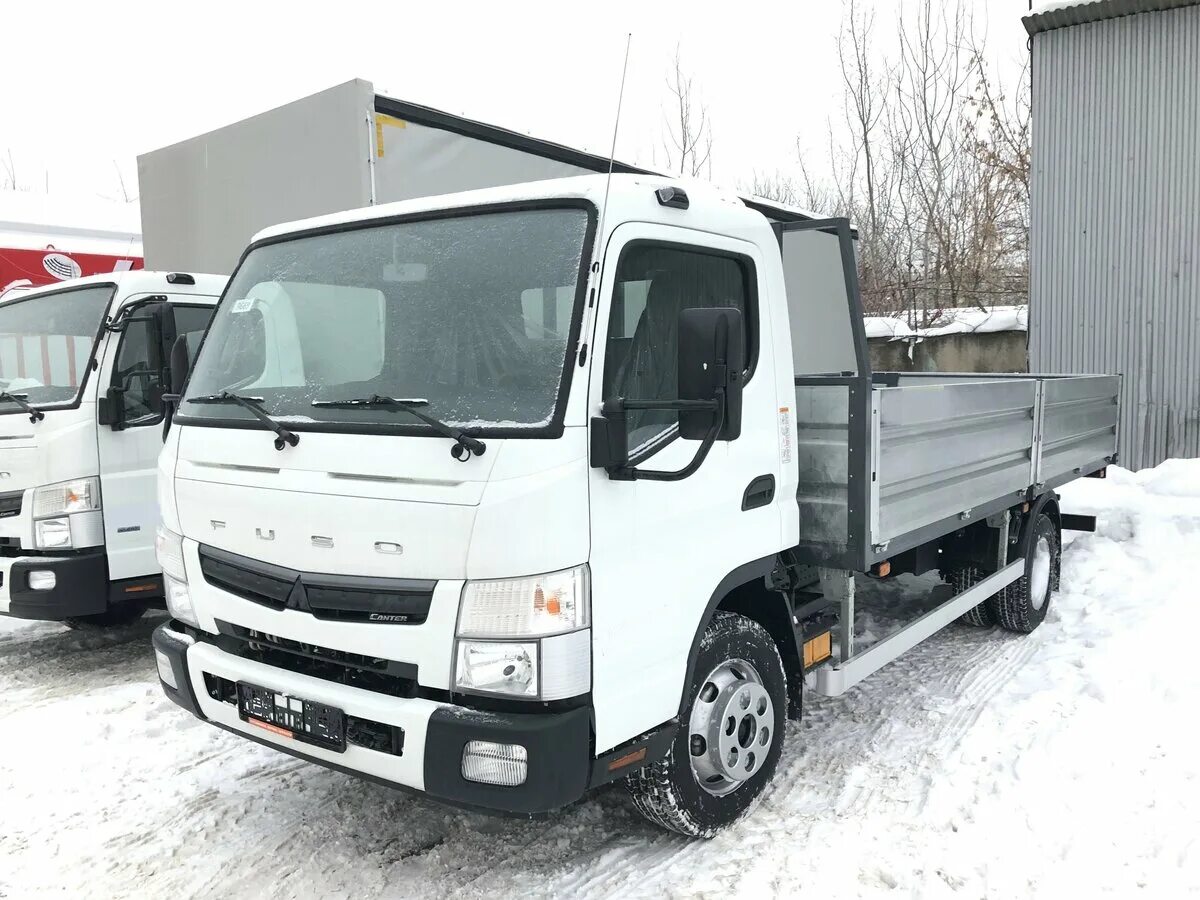 Mitsubishi бортовой. Mitsubishi Fuso Canter TF. Fuso Canter бортовой. Mitsubishi Fuso грузовой бортовой. Fuso Canter TF 7.5 Т шасси.