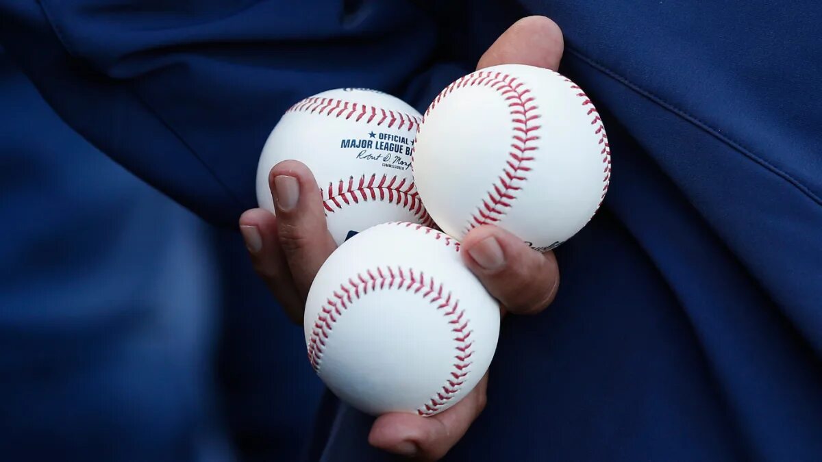 How many balls. Baseball game. baseball ball face. how is baseball useful. mlb1 130410.
