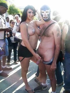 Slideshow carnival girl grabs dick.