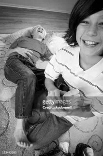 Tickling kid feet