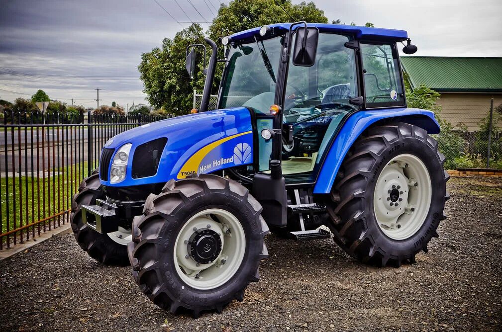 New holland t. Трактор Нью Холланд. New Holland трактор t5050. New Holland трактор 5060. New Holland t7000.