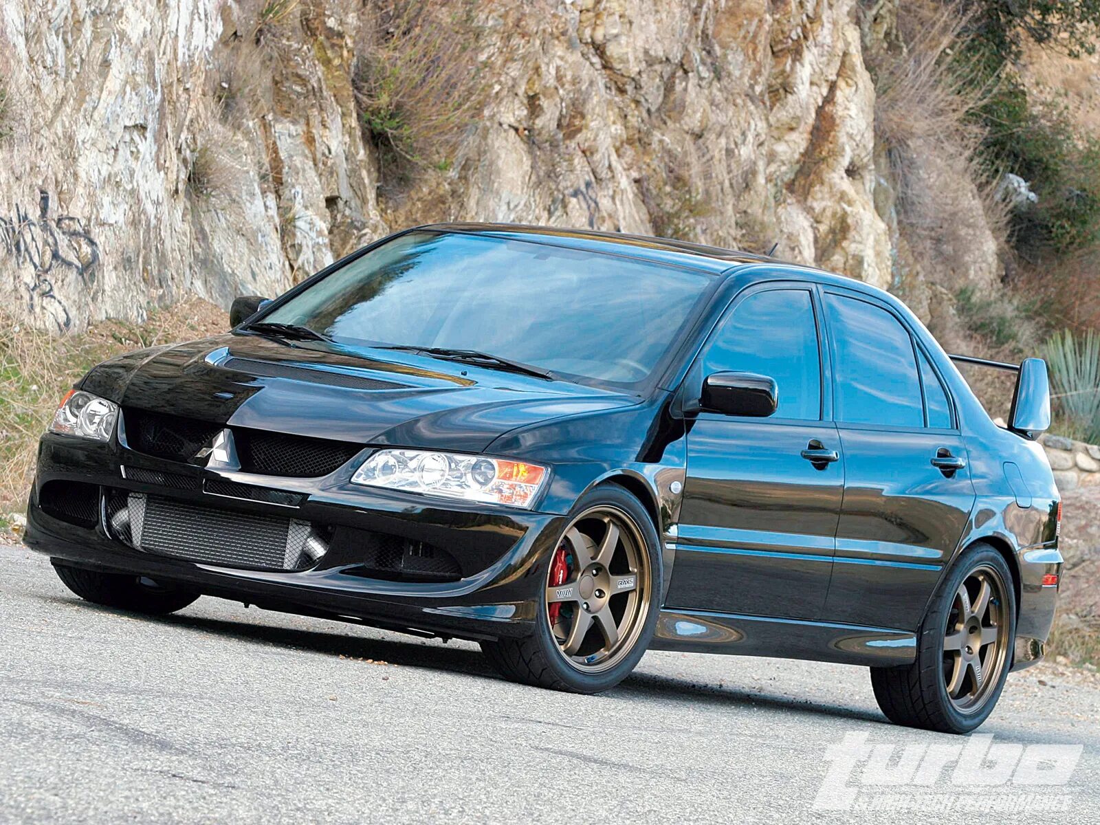 Mitsubishi evo 8. Митсубиси Лансер Эволюшн. Лансер Эволюшн 8. Mitsubishi Lancer Evolution 2003.