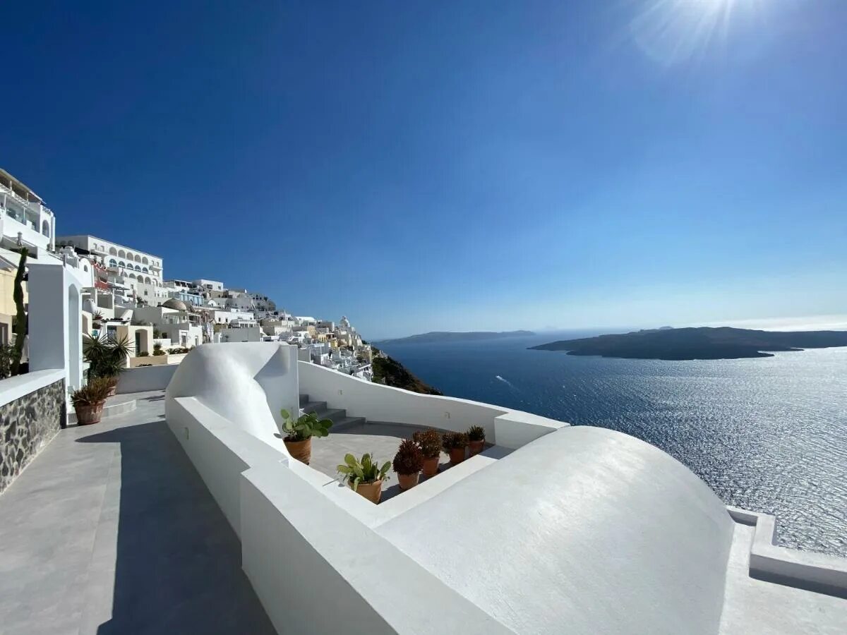 Greece hotel with panarama window. Санторини тира фото. Panorama suites. Panorama suites. Стомио греция.