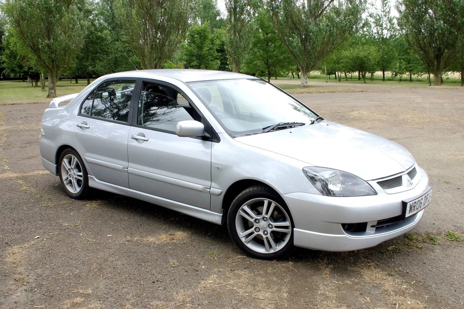 Mitsubishi lancer 2005 года. Mitsubishi Lancer 2005. Митсубиси Лансер 2005. Мицубиси Лансер 9 2005. Mitsubishi Lancer IX 2005.