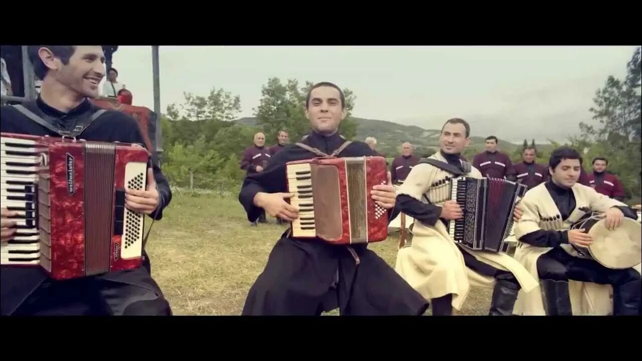 Веселые грузинские песни. Грузинский танец Рачули. Грузия фольклор. Грузинские группы музыкальные современные. Грузинские видеоклипы.