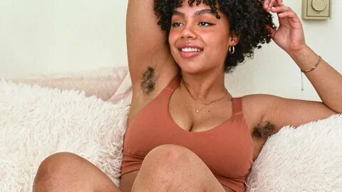 Download Hairy Woman With Afro Curly Hair Wallpaper | Wallpapers.com.