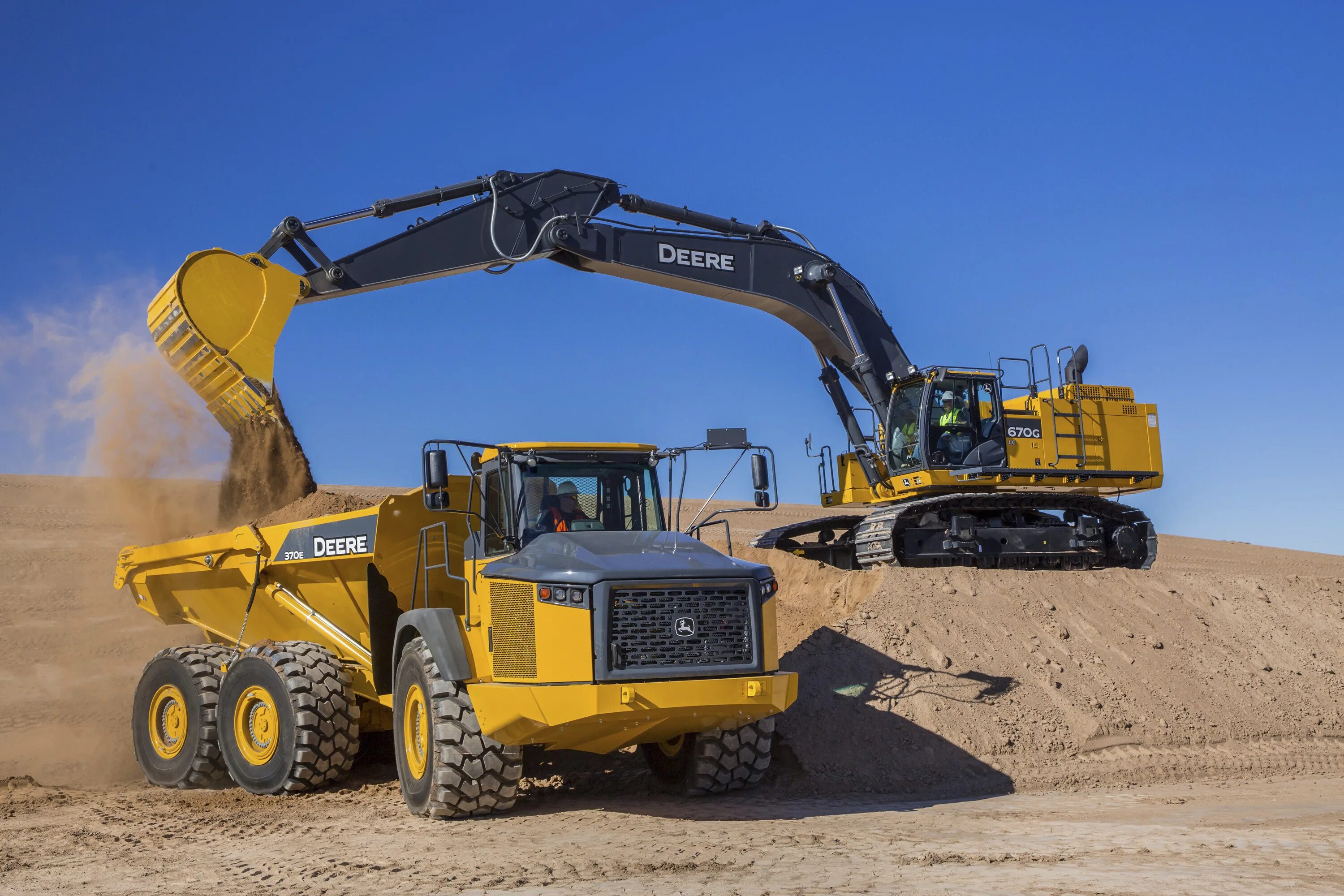 Сочлененный самосвал John Deere 370e. Экскаватор John Deere 670g. John Deere 370e шарнирно-сочлененный карьерный.... Джон Дир сочлененный самосвал. Тяжелый экскаватор