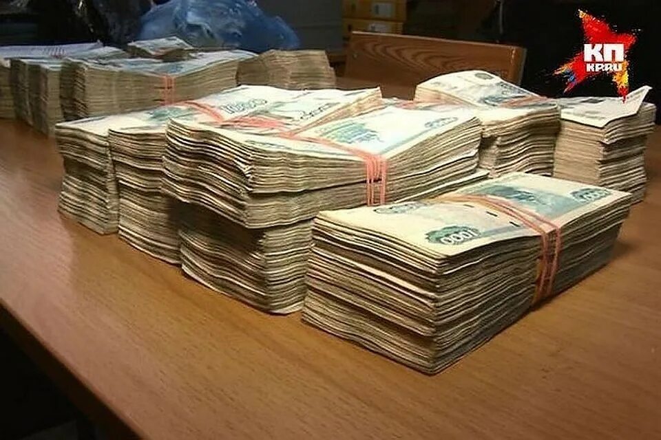 куча денег. миллиард рублей. очень много пачек денег. большие деньги пачками. где взять 15 млн рублей.