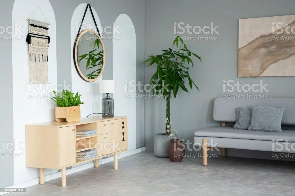 Next to the Sofa. The Mirror above the washbasin. The Lamp is in the Cupboard.