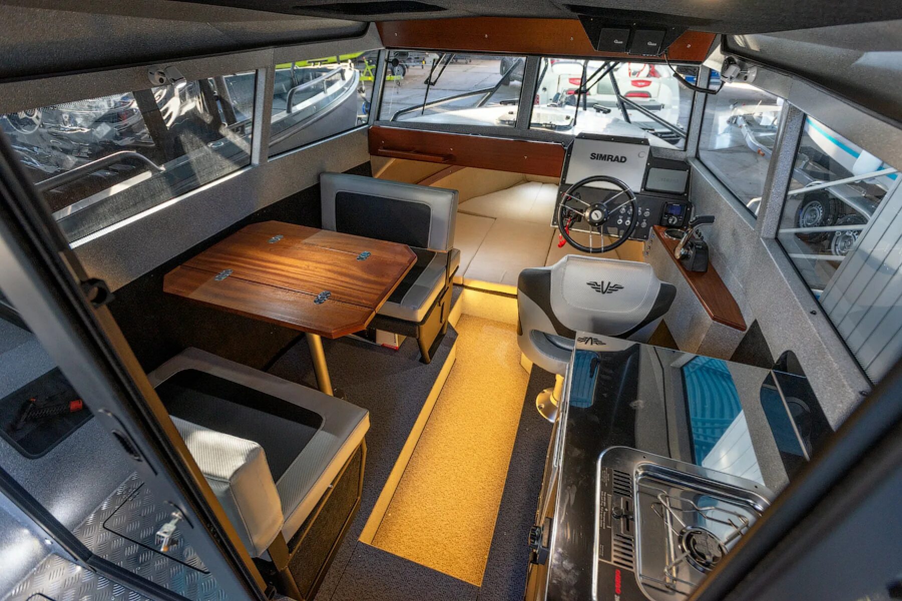 Катер волжанка 67 кабин. Катер realcraft 600. Волжанка вояджер 700 кабин. Cabin катера. Волжанка 700 cabin voyager.